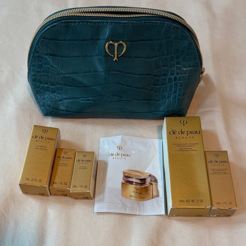 Clé de Peau Beauté Skincare Set with Teal Croc Cosmetic Pouch